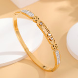 Brazalete de acero de titanio con trébol de cuatro hojas brillante para mujer