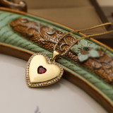 Collar con colgante chapado en oro de 18 quilates con incrustaciones de cobre y forma de corazón de viaje de estilo simple
