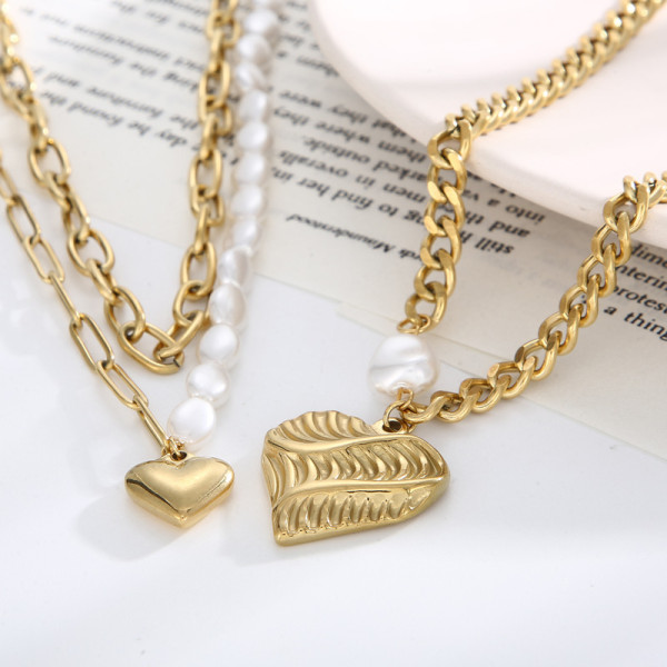 Collar elegante de las pulseras de la galjanoplastia de acero del titanio de la perla de agua dulce de la forma del corazón