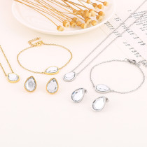 Conjunto de joyería chapado en oro de 18K con incrustaciones de acero de titanio con gotas de agua brillantes de Streetwear