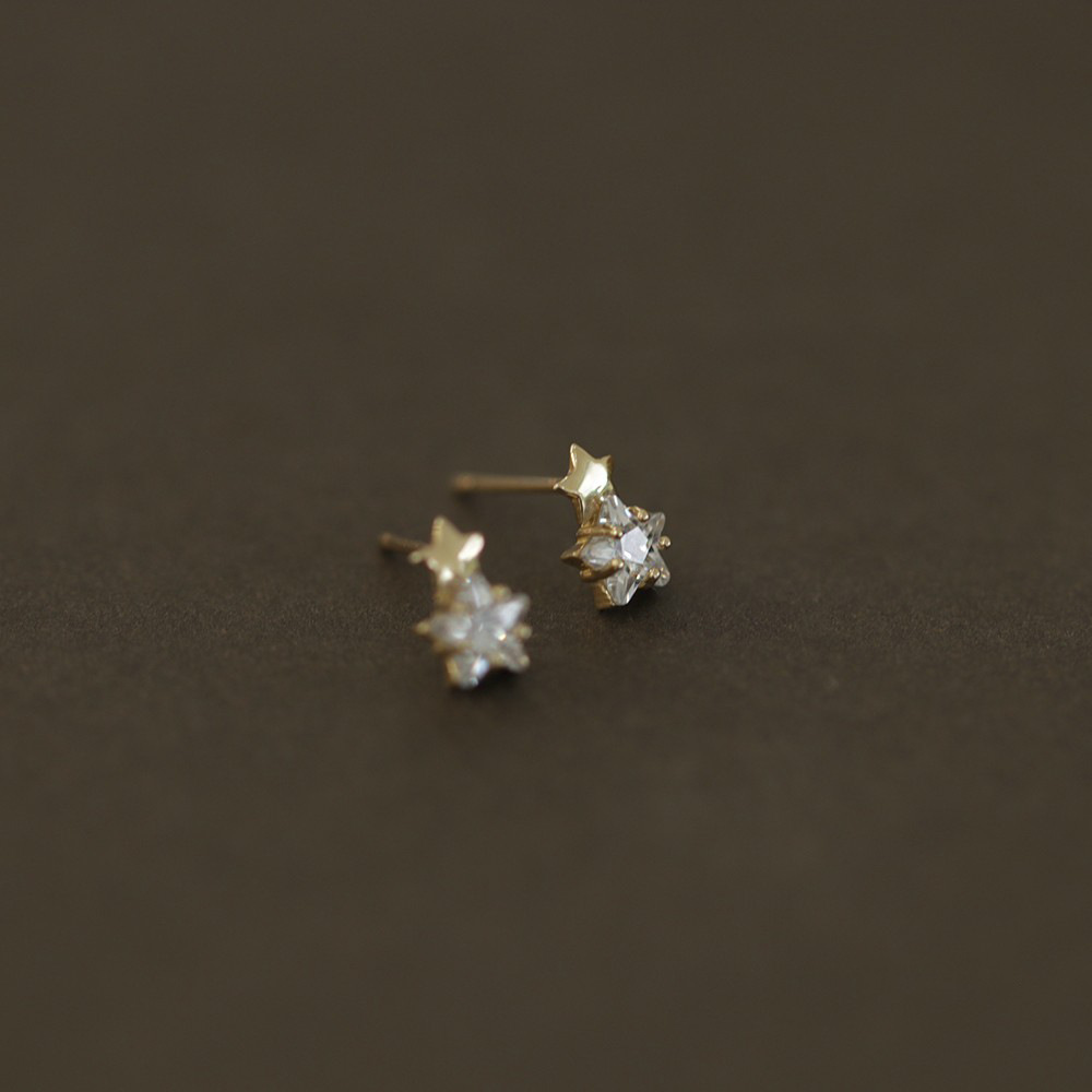 1 par de pendientes de diamantes de imitación con incrustaciones de cobre de estrella de estilo simple