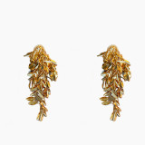 1 par de aretes de cobre con borlas de hojas glamorosas