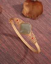 Brazalete chapado en oro de 18 quilates con incrustaciones de piedras preciosas artificiales y cobre geométrico clásico chinoiserie