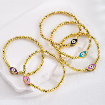 Pulseras chapadas en oro de 18 quilates de cobre con ojo de diablo retro a granel