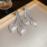 Pendientes de diamantes de imitación con incrustaciones de cobre en forma de corazón de estilo simple