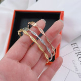 Brazalete de diamantes de imitación con incrustaciones de acero de titanio redondo de estilo simple