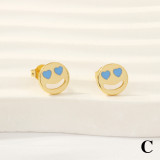 1 par de pendientes chapados en oro de 18 quilates con esmalte de cara sonriente en forma de corazón de estilo Simple