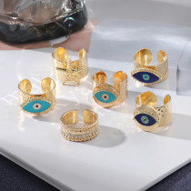 Anillo abierto de diamante artificial con incrustaciones de esmalte de cobre de aleación de ojo de diablo retro