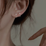 1 par de aretes de circonio de cobre con incrustaciones en forma de C de estilo simple