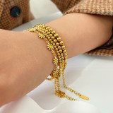 Pulseras redondas chapadas en oro de acero inoxidable de estilo clásico