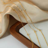 Collar chapado en oro de 18 quilates con incrustaciones de acero de titanio de color sólido para dama elegante