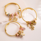 Elegantes pulseras chapadas en oro con incrustaciones de acero y titanio con diamantes de imitación en forma de corazón y luna dulce