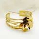 Brazalete chapado en oro pulido de acero inoxidable con flor dulce de estilo vintage elegante