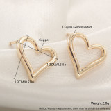 1 par de pendientes chapados en oro con incrustaciones de nudo de lazo en forma de corazón de estilo Simple