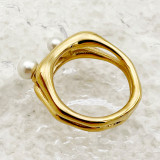 Anillos chapados en oro de perlas artificiales con incrustaciones redondas de acero inoxidable de viaje de estilo simple