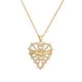 Collar con colgante chapado en oro con incrustaciones de cobre y forma de corazón cruzado estilo Simple IG