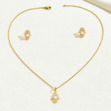 Conjunto de joyería chapado en oro de perlas artificiales con incrustaciones de acero inoxidable de palma de estilo simple elegante