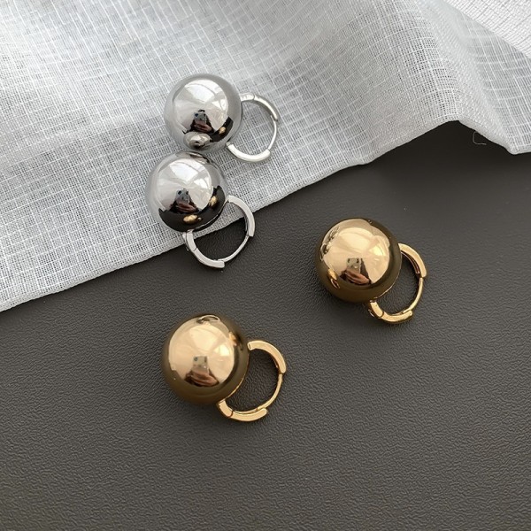 1 par de aretes de cobre redondos de estilo simple