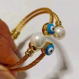 Brazalete de perlas con incrustaciones de esmalte de cobre y acero inoxidable con ojo de estilo simple retro
