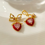 1 par de pendientes de diamantes de imitación con incrustaciones de cobre en forma de corazón de estilo simple