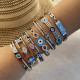 Brazalete lujoso con revestimiento de acero inoxidable Commute Eye