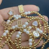 Moda estrella forma de corazón cara sonriente incrustaciones de cobre perlas artificiales Shell pulseras de circón