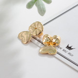 1 par de manguitos de oreja de cobre chapados en corona con forma de corazón de trébol de cuatro hojas de estilo Simple