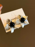 1 par de pendientes de perlas de cobre con incrustaciones de flores de estilo simple