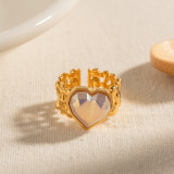 Anillo abierto chapado en oro de 18 quilates con incrustaciones de piedras preciosas artificiales con revestimiento de acero inoxidable en forma de corazón estilo IG