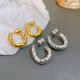 Pendientes con revestimiento de cobre en forma de C a la moda, 1 par
