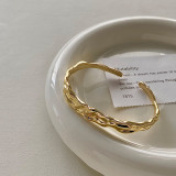 Pulseras de puño chapadas en oro con revestimiento de cobre redondo de estilo simple
