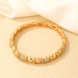 Brazalete chapado en oro con circonita turquesa con incrustaciones de cobre redondo brillante elegante informal