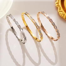 Brazalete de concha de diamantes de imitación con incrustaciones de acero de titanio de color sólido de estilo simple
