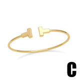 Brazalete chapado en oro de 18 quilates con incrustaciones de cobre y flor de estilo simple a la moda