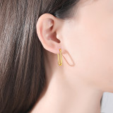 1 par de pendientes chapados en oro de 18 quilates de acero inoxidable chapado en forma de U de estilo simple