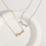 Venta al por mayor elegante collar de circonita chapado en oro de acero titanio con letra MAMA de 18 quilates