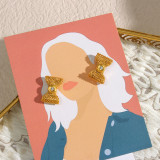 Pendientes de acero inoxidable con nudo de lazo geométrico dulce Pendientes de acero inoxidable con circonitas