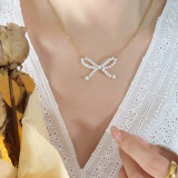 Estilo simple Nudo de lazo Acero de titanio Chapado en perlas Collar con colgante 1 pieza