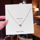 Collar de diamantes de imitación de perlas artificiales con incrustaciones de acero de titanio con forma de corazón de trébol de cuatro hojas geométrico de estilo Simple