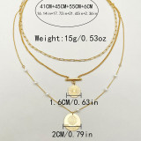El estilo simple viaja alrededor del collar plateado oro de tres capas del acero inoxidable en bulto
