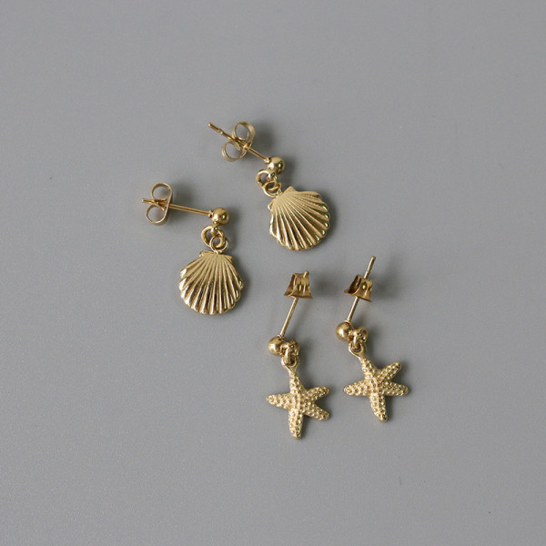 1 par de aretes colgantes chapados en oro de 14 quilates de acero titanio con concha de estrella de mar de estilo simple de playa