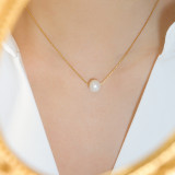 Collar con colgante chapado en oro de 18 quilates de acero titanio con perlas de agua dulce redondas de estilo simple y clásico