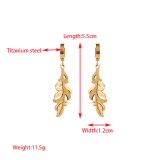 1 par de pendientes chapados en oro de acero titanio con ojo de hojas redondas elegantes y lujosos