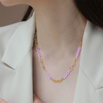Nuevo collar de acero inoxidable con cadena cruzada de acero de titanio púrpura chapado en oro de 18 quilates