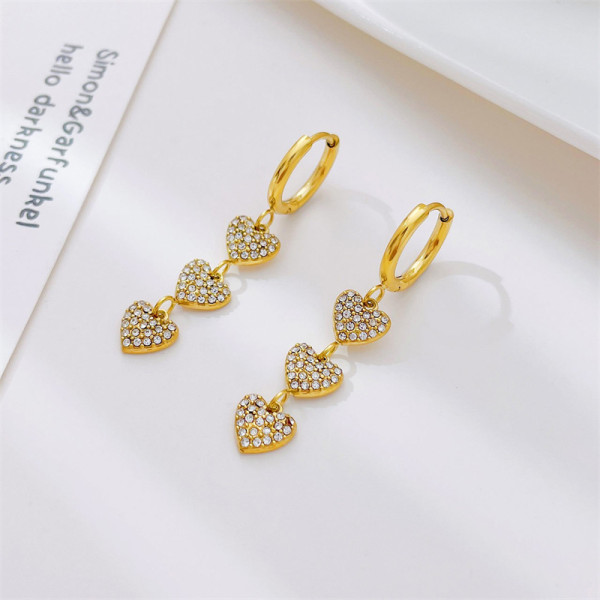 1 par de pendientes colgantes chapados en oro blanco con incrustaciones de acero inoxidable y diamantes de imitación chapados en forma de corazón de estilo Simple