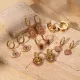 1 par de pendientes colgantes chapados en oro de 18 quilates con incrustaciones de circonio de acero inoxidable con forma de corazón geométrico Ojo del diablo estilo francés estilo vintage estilo simple
