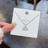 Collar con colgante de diamantes de imitación con incrustaciones de acero titanio y corona en forma de corazón y estrella a la moda