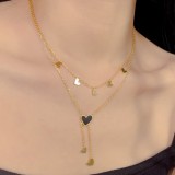 Collares en capas chapados en oro de 18 quilates con incrustaciones de acero de titanio con forma de corazón de estilo simple y dulce