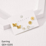 3 pares de pendientes chapados en oro de concha de diamantes de imitación de acero inoxidable con incrustaciones huecas chapados en flores de trébol de cuatro hojas de estilo Simple