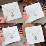Collar con colgante de diamantes de imitación con incrustaciones de acero titanio y corona en forma de corazón y estrella a la moda